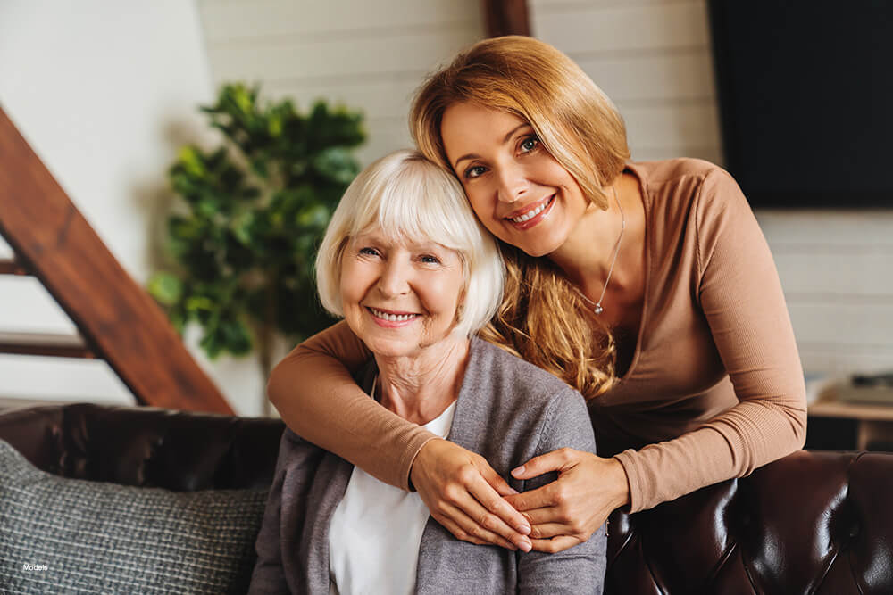 A woman embracing her mother
